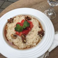 milky rice porridge with almond/coconut milk, caramel walnuts and maple syrup at Mondieu - Laurinska in Bratislava
