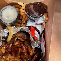 Takeout vegan wings + fries at Black & Blue in Easton
