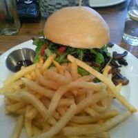 Yummy Mushroom Mafia burger with chips. at Duke's Burgers in Johannesburg