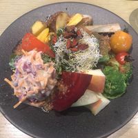 My third plate served by a staff at Cosme Kitchen Adaptation - Atre West in Tokyo