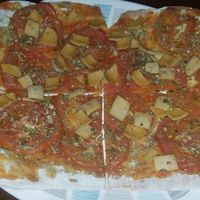 Vegan pizza at Sinergiarte in Bogota