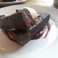 Chocolate hazelnut torte with ice cream  at Crazy Bean Cafe in Great Bookham