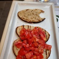 Mushroom and tomato bruchetta already started. (Amazing) at Origano Campo de' Fiori in Rome