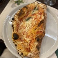 'Vegan "Mezzaluna" (half Margherita, half calzone)  at Origano Campo de' Fiori in Rome