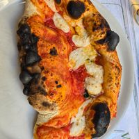 Half pizza half calzone at Origano Campo de' Fiori in Rome