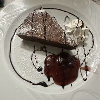 Vegan chocolate cake with cream and jam  at Origano Campo de' Fiori in Rome