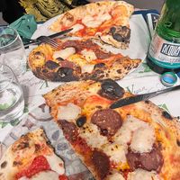 Pizza diavola e mezzaluna prosciutto e funghi at Origano Campo de' Fiori in Rome