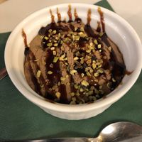Chocolate mousse with salted caramel and pistachio  at Origano Campo de' Fiori in Rome