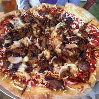 Pizza with tempeh, pineapple, onion, kalamata olives, and Daiya. YUM! at Mellow Mushroom in Wrightsville Beach