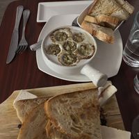 Vegan escargot and cheese plate for the table  at Delice & Sarrasin in New York City