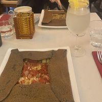 2 savoury crêpes accompanied by a lemonade and a macadamia nut milk cappuccino   at Delice & Sarrasin in New York City