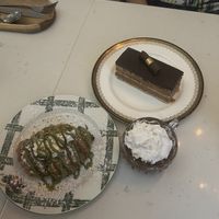 Pistachio Chocolate croissant, chocolate mouse, and opera cake  at Delice & Sarrasin in New York City