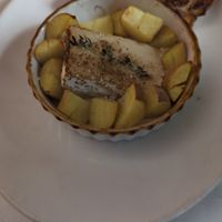 Brie roti végétal - wedge of brie with thyme and potatoes and bread at Delice & Sarrasin in New York City