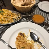 Kind, attentive, tasty and 100% plant based options. Whole flour naan + bryani  at Masala House in Portimao