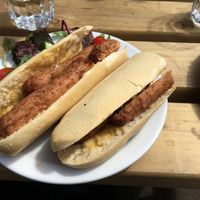 Vegan hotdog with onion  at Plant by Kat's Kitchen in Keswick