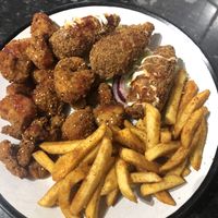 Moroccan Cauliflower Bites, Crispy Jackfruit Wings and Peri Peri Fries  at Veggie Supreme in Wolverhampton