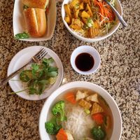 Top left is the tofu bahn mi, top right is the tofu vermicelli, bottom is tofu and broccoli pho. at Pho Pier 77 in Panama City Beach