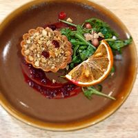 Filo pastry tart filled with wild mushrooms served with summertime salad at The Allotment in Manchester