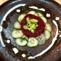 Beetroot tartare served on a cucumber carpaccio with a kefir and dill dressing at The Allotment in Manchester