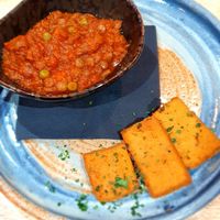 Traditional Italian lentil ragu served with panelle at The Allotment in Manchester