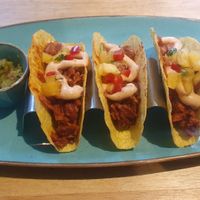 Jackfruit Tacos - Tacos filled with tex mex braised jackfruit, served with guacamole, chipotle mayo & fresh pineapple salsa at The Allotment in Manchester