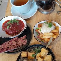 Garlic & truffle fries, soy balls in tomato sauce, tofu satay skewers at The Allotment in Manchester