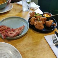 Soup with bread (left) and cauliflower wings (right) at The Allotment in Manchester