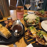 Bao buns, cashew noodles salad, cauli, focaccia sandwich with wedges n gravy at The Allotment in Manchester