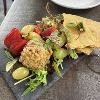 Cheese plate, looks nice but the Brie tasted nothing and the pickled grapes was disgusting and took over all flavors  at Modern Love in Brooklyn