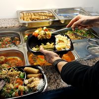 The main part of the asian buffet including green beans, spring rolls, filled tomatoes and fried eggplant. at Butterfly in Basel
