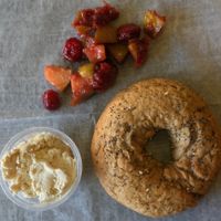 Really good gluten free vegan bagel with strawberry chia jam or vegan cream cheese. Really the best bagel I have ever had - and I'm from NY!! at The Pureganic Cafe in Harrison