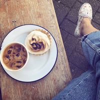 Vegan lemon meringue tart and iced coffee  at The Grand Howl in East London
