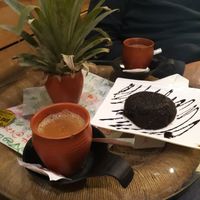 Chocolate cake and massala tea with soy milk at Grasswood Cafe in Udaipur