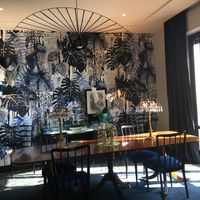 Dining area at Velona's Jungle Luxury Suites in Florence