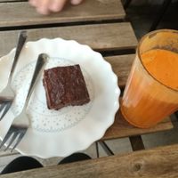 Vegan Brownie with fresh juice ( carrot, ginger and apple) at Taste in Luebeck