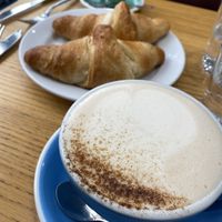 Chai latte and espresso with our hot croissants!  at Cloud Cakes - Mandar in Paris