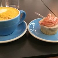 turmeric latte & strawberry-vanilla cupcake- amazingly good! at Cloud Cakes - Mandar in Paris