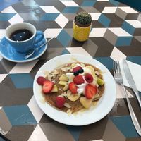 Vegan Pancakes with fruit, whipped cream, and maple syrup; americano on the side at Cloud Cakes - Mandar in Paris