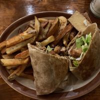 Kentucky fried wrap with vegan cheese and mayo, side of fries at Hunter Gatherer Vegetarian Diner in Regina