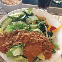 Rice and two veggie sides with peanut sauce at Kantjil & De Tijger in Amsterdam