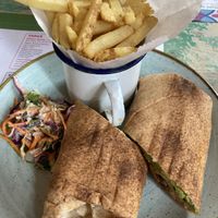 Vegan roasted sweet potato burrito with extra fries at Estero Lounge in Monmouth