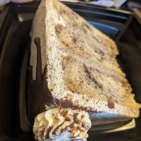 Cookies and Cream Cake slice. Vegan & Gluten free! It was better when I heated it for 20 seconds in the microwave at Lassens Natural Foods & Vitamins in Ventura