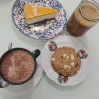 Cacao with spices,  juice, cookie and cheesecake at Sweet Paradise in Tenerife