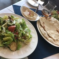 Traditional Hummus, Fattoush, and hot pita at Daddy's Place in Easton