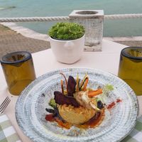 Hummus with vegetables at Vecchio Mulino Beach in Peschiera Del Garda