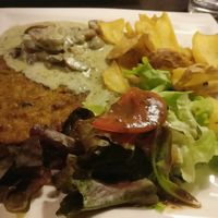 ";Escalope"; de riz sauce champignons et frites at Sherlock Holmes  in Quimper
