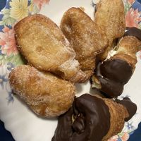 Susus de crema y caracolas de nata y chocolate  at Panaderia Los Manchegos in Valencia