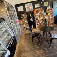 Cool Ⓥ sweat jackets and mugs here  at The Workshop Vegetarian Cafe in North Vancouver