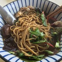 Shoyu ramen after noodles mixed up at The Workshop Vegetarian Cafe in North Vancouver