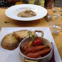 Mains- a risotto and a roasted vegetable dish at Cantine Bernardini in Lucca